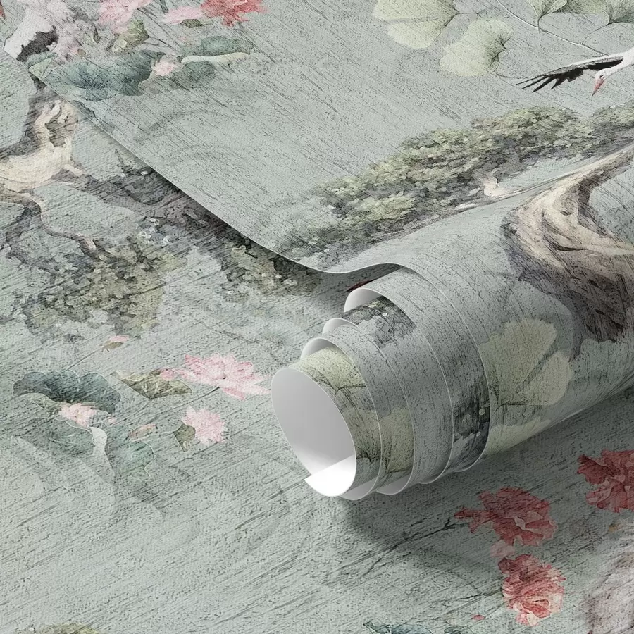 Fototapete Kraniche zwischen Kiefern und Lotusblumen vor einem ruhigen grünen Hintergrund a00962