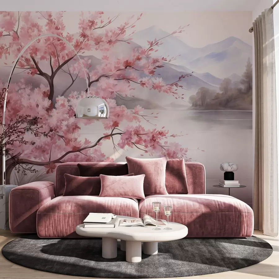Murale Une peinture de paysage représentant un arbre en fleurs roses, un lac et des montagnes brumeuses en arrière-plan w09870